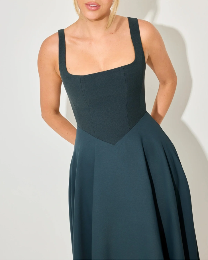 Woman wearing teal square neck midi dress with full skirt and strappy sandals — ODD MUSE | Endless UAE
