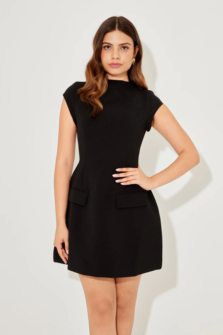 Woman wearing black cap sleeve mini dress with pockets — Odd Muse | Endless UAE