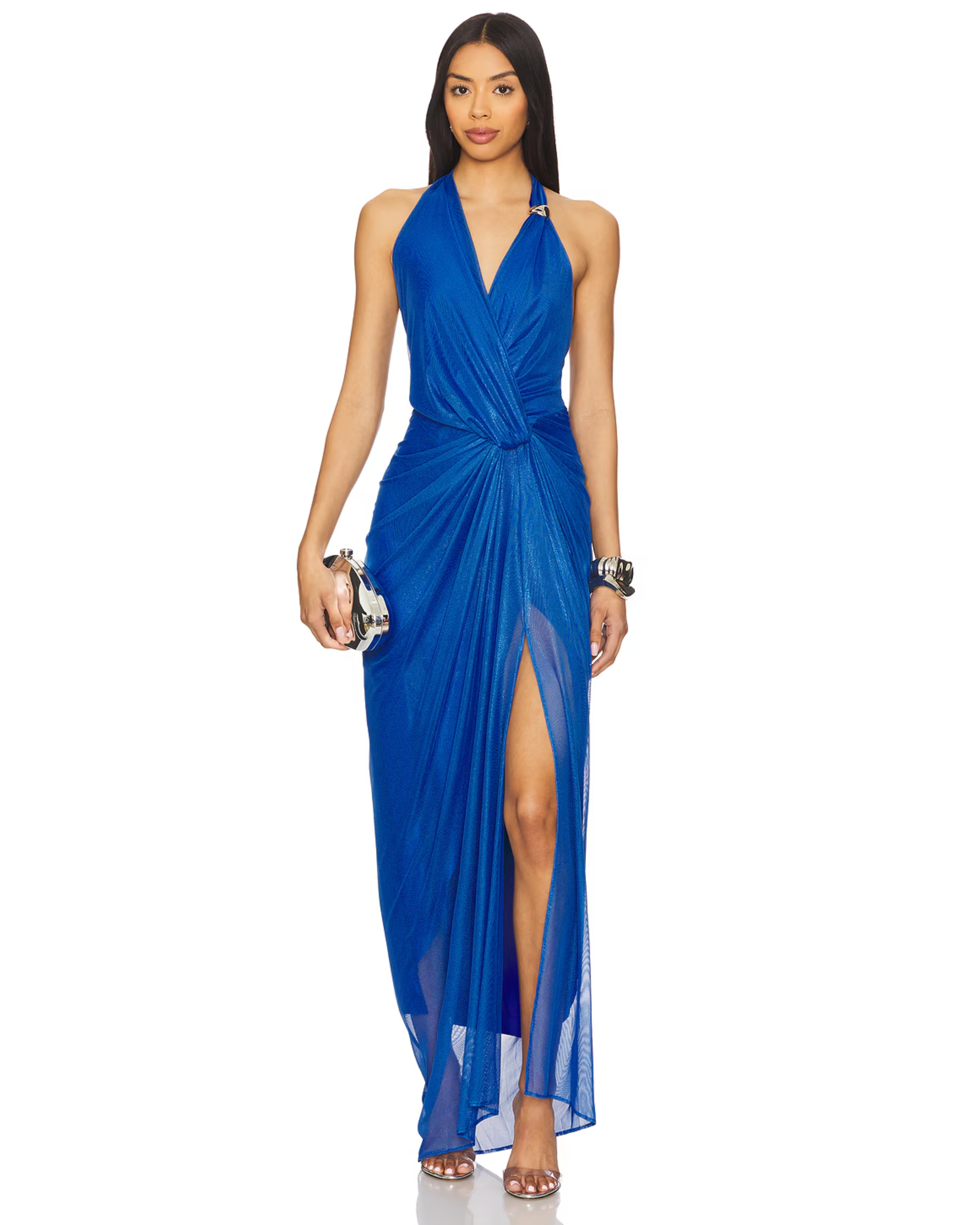 Woman wearing royal blue halter wrap maxi dress with draped side slit and gold accessories — Baobab | Endless UAE