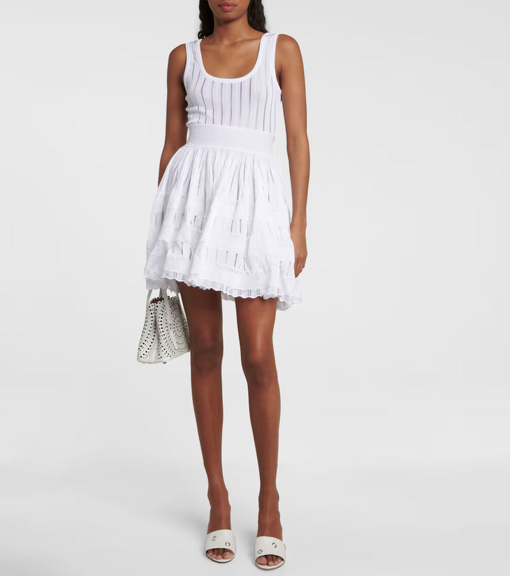 White ribbed crinoline mini dress with tiered skirt — Alaia | Endless UAE