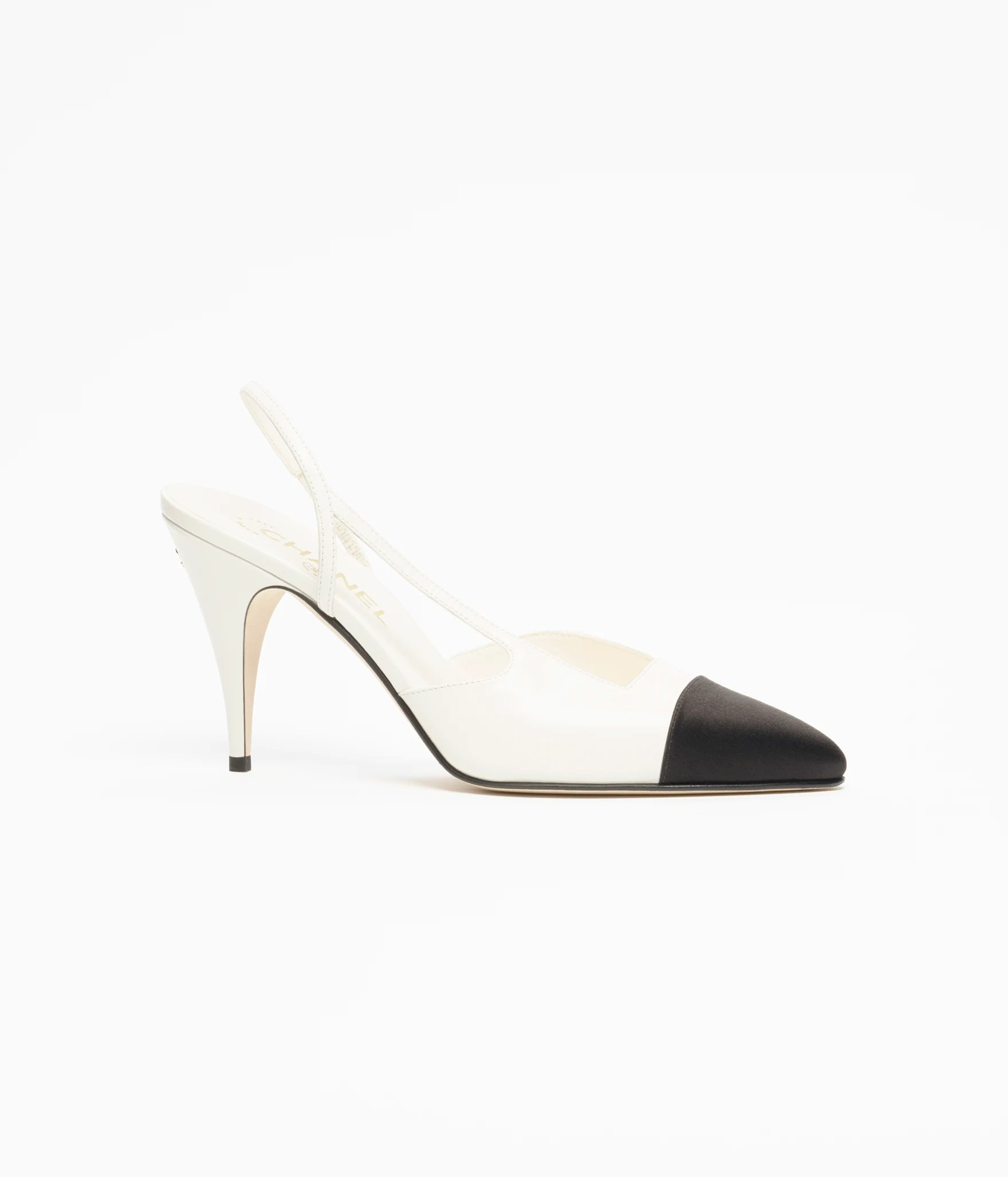 Chanel Métiers d'Art 2026 white and black heeled slingback shoes — Chanel | Endless UAE