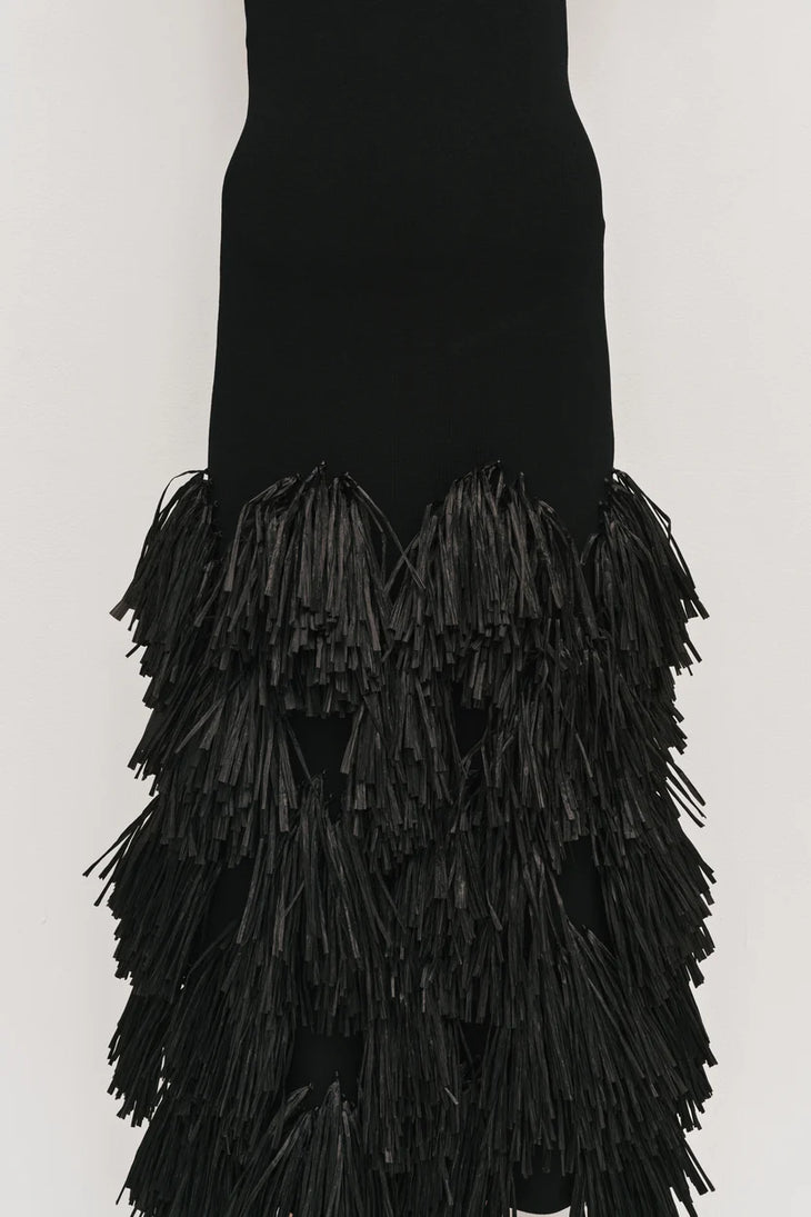 Black halter neck knit dress with tiered raffia fringe skirt — Aje | Endless UAE