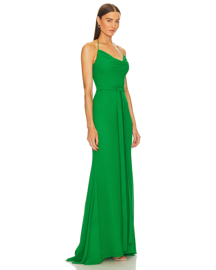 Woman wearing green draped cowl neck gown with waist tie and train — Michael Costello | Endless UAE