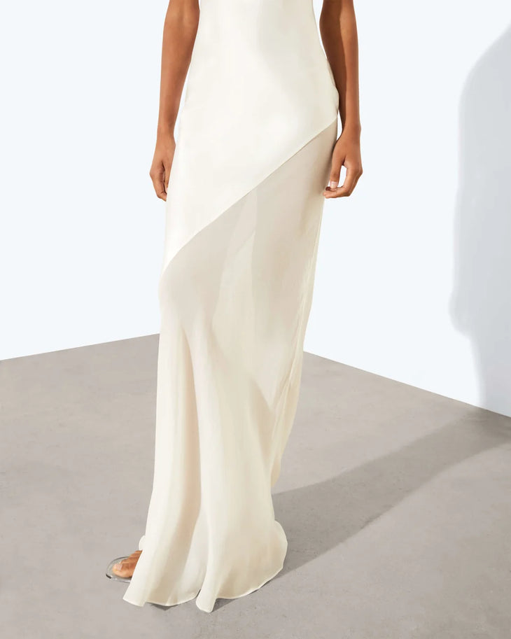 Ruba Slip Dress in cream worn by model against white background — Rat & Boa | Endless UAE