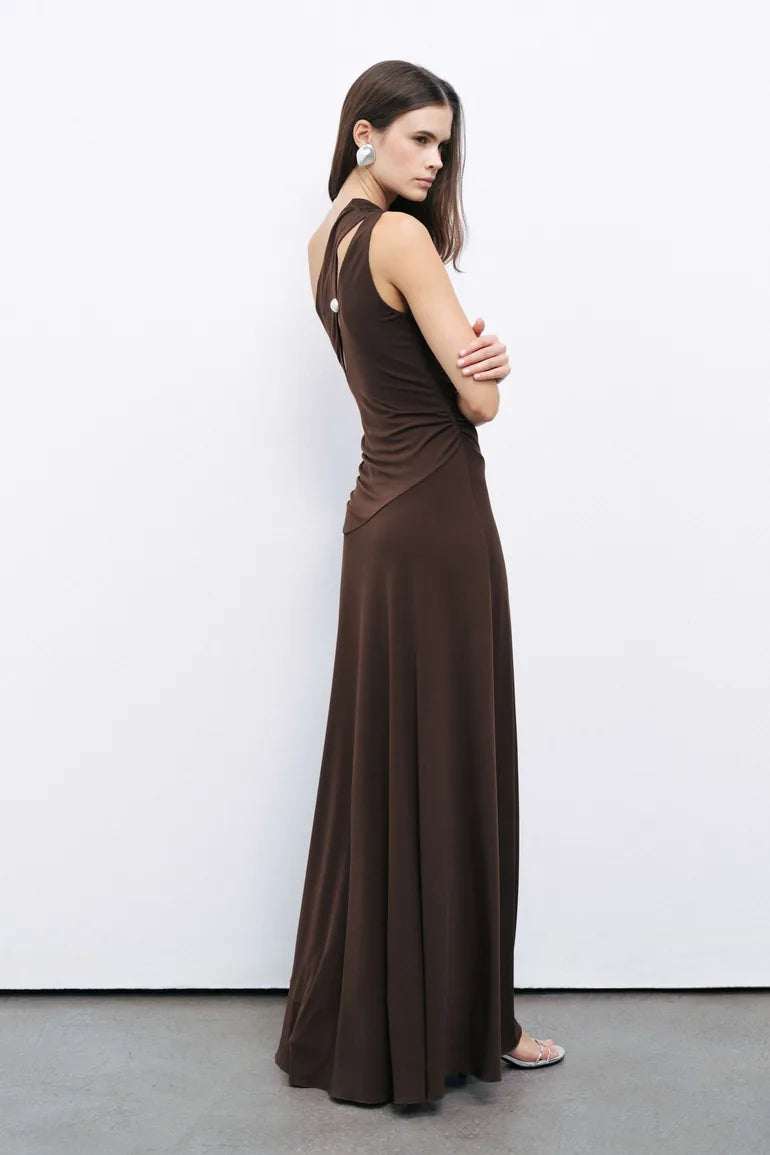 Woman modeling brown one shoulder maxi dress with open back detail — Nocturne | Endless UAE