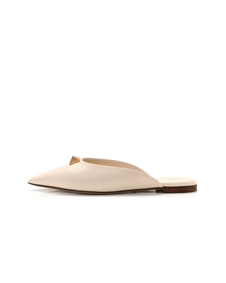Cream leather Roman Stud flat mules with gold pyramid studs and VD logo — Valentino Garavani | Endless UAE