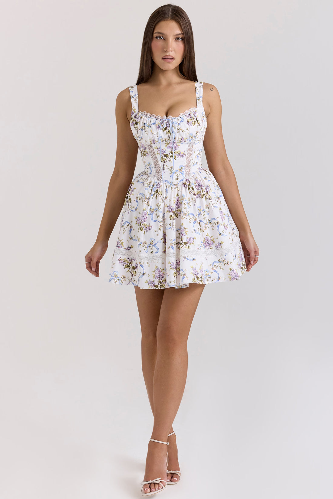 Woman wearing white floral ribbon print cotton mini dress with sweetheart neckline and full skirt — House of CB | Endless UAE
