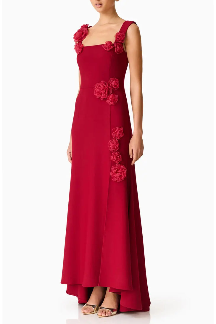 Red sleeveless high-low gown with floral embellishments on shoulders and side — Elliatt | Endless UAE