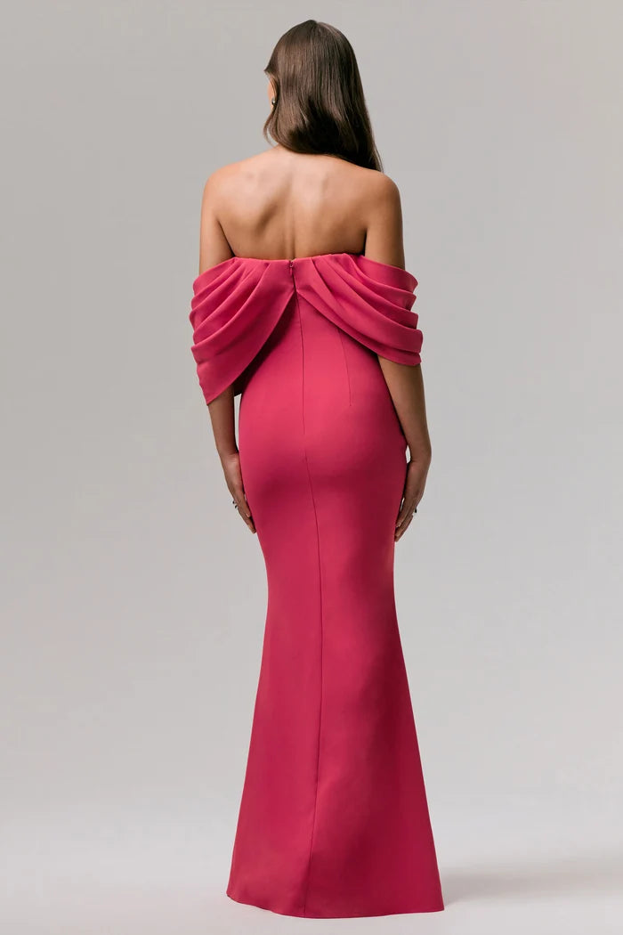 Woman wearing hot pink off-shoulder draped maxi dress with elegant draping detail — Club L London | Endless UAE