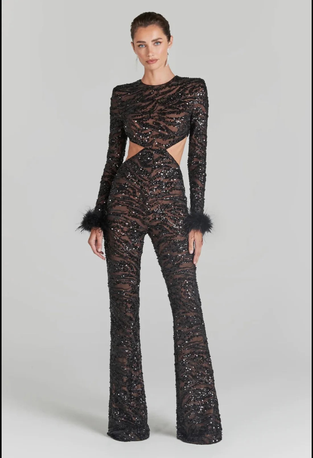 Black sequin jumpsuit with cutout details and feathered cuffs — Nadine Merabi | Endless UAE