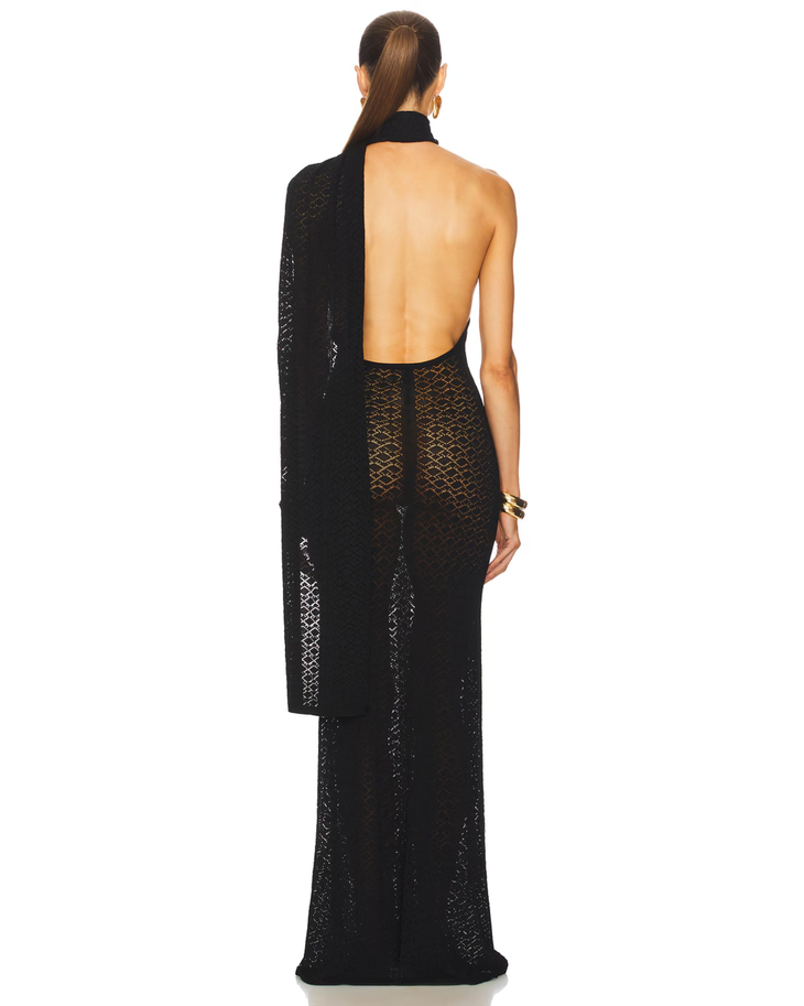 Black lace halter gown with draped wrap detail and gold clutch — Helsa | Endless UAE