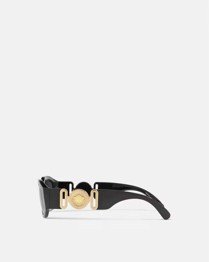 Black Medusa Biggie sunglasses with dark lenses and gold medusa emblem on sides — Versace | Endless UAE