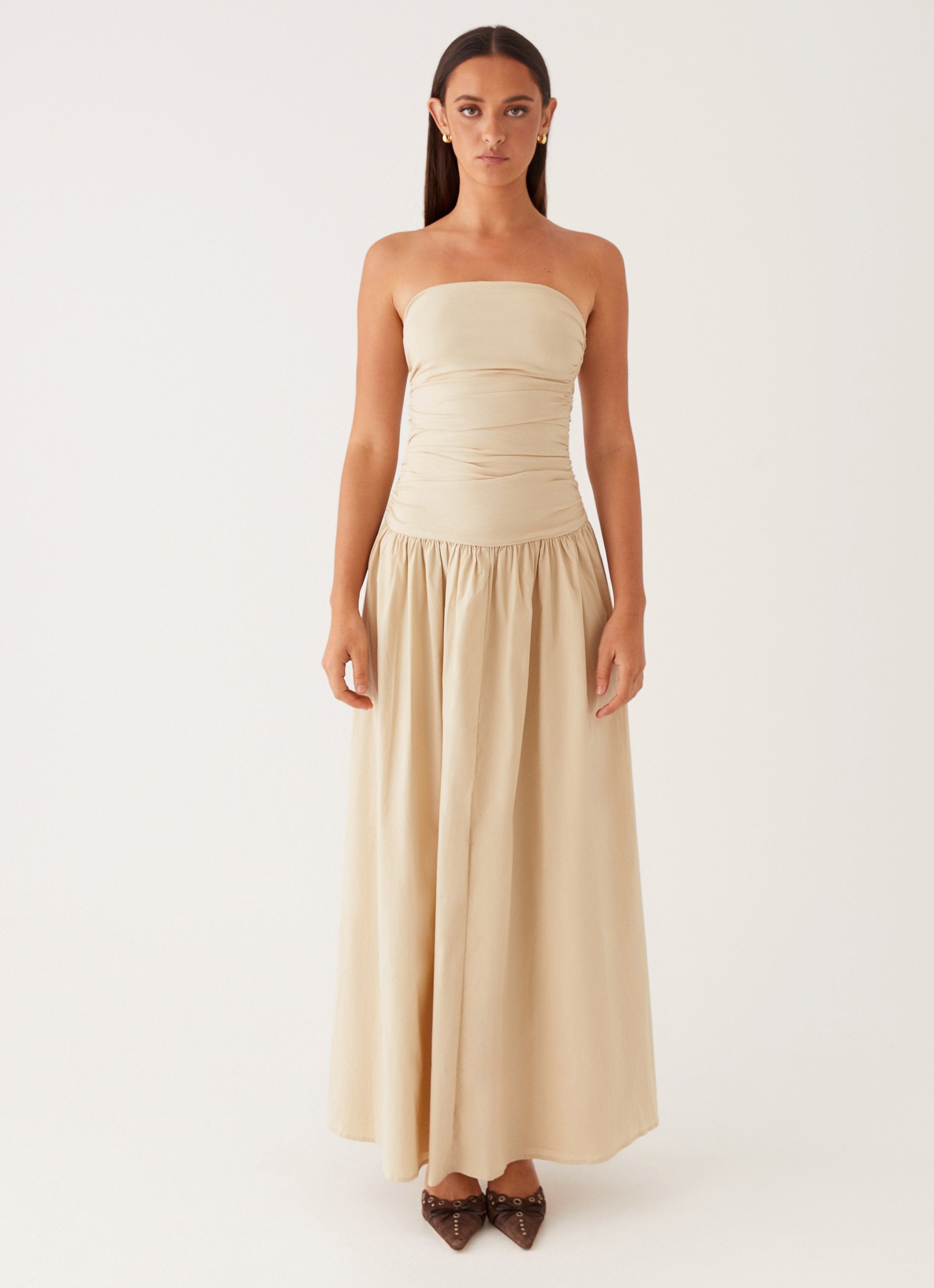 Cream strapless maxi dress with ruched bodice and flowing skirt — Peppermayo | Endless UAE