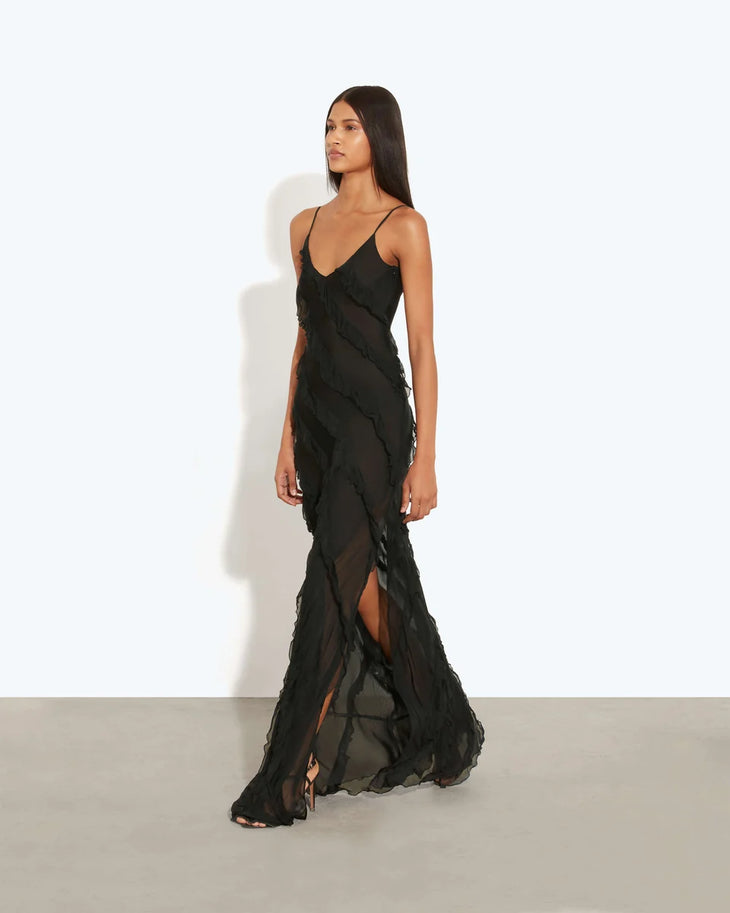 Woman wearing black sleeveless Selena Dress with ruched detailing and diagonal seaming — Rat & Boa | Endless UAE