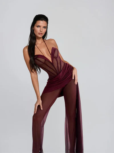 Burgundy halterneck mesh draped jumpsuit on model — Mew Mews | Endless UAE