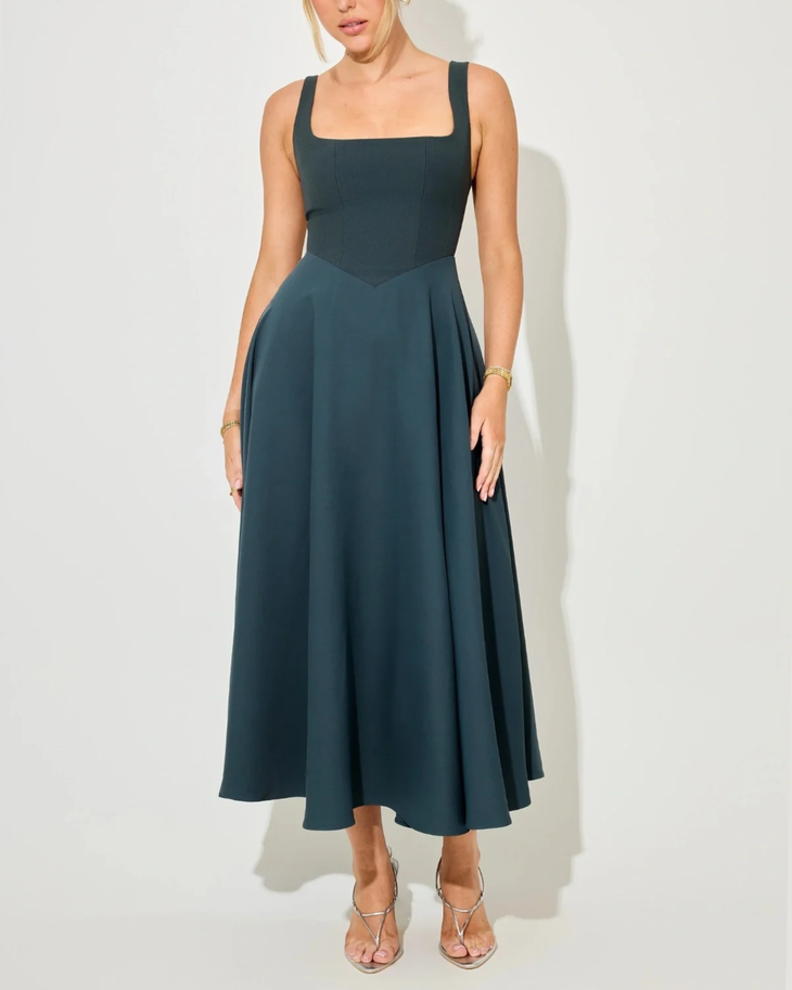 Woman wearing teal square neck midi dress with full skirt and strappy sandals — ODD MUSE | Endless UAE