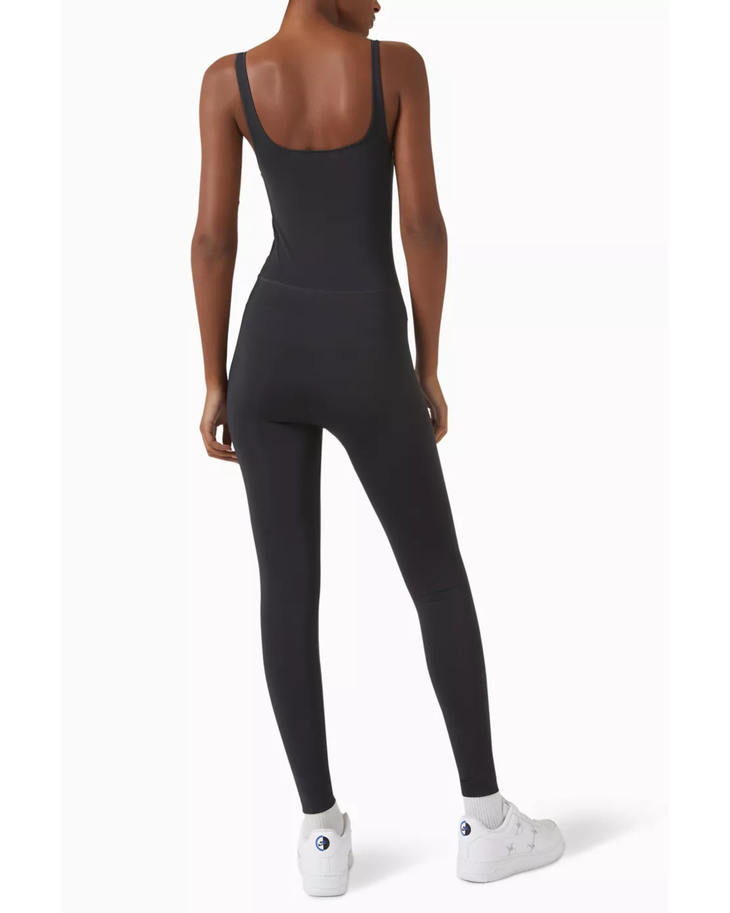 Black seamless catsuit with tank straps and full-length legs — Skims | Endless UAE
