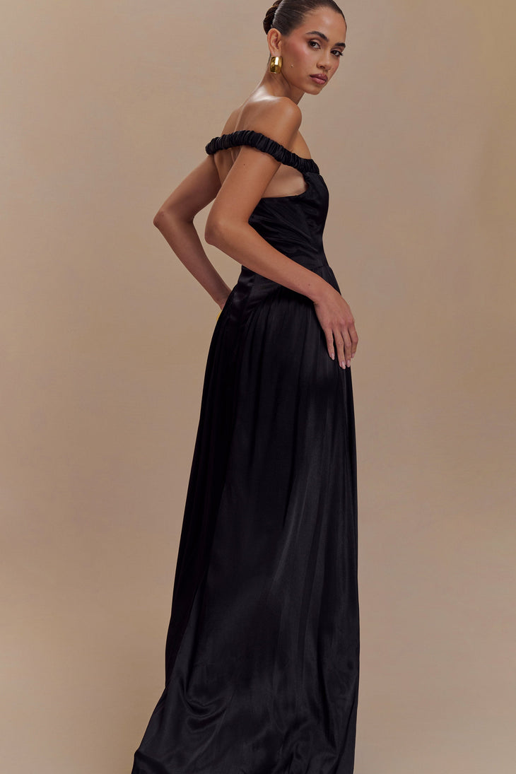 Black off-shoulder maxi dress with dropped waist and pleated skirt — Meshki | Endless UAE