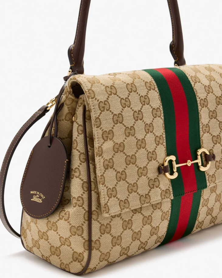 Gucci Paparazzo Medium Top Handle Bag in beige GG canvas with brown leather handles and green-red-green web stripe — Gucci | Endless UAE