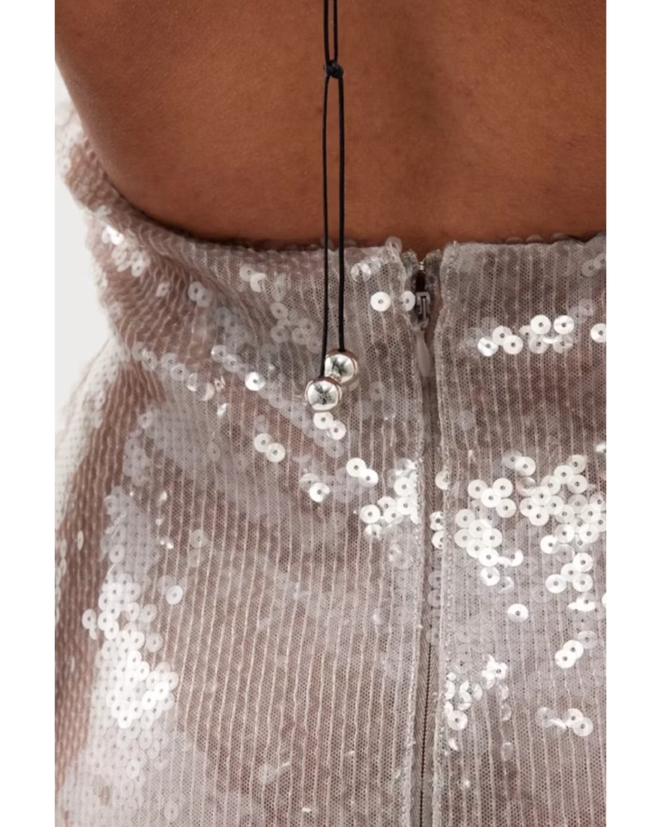 Sequinned halter midi dress with keyhole cutout detail in silver — 16Arlington | Endless UAE