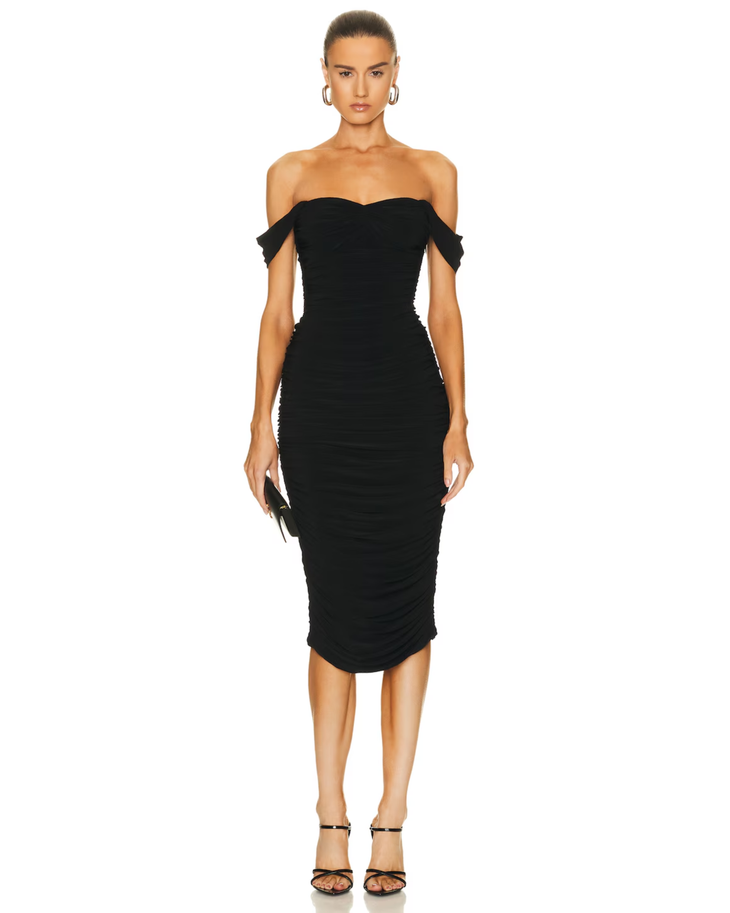 Woman wearing black off-shoulder ruched midi dress with bow details — Norma Kamali | Endless UAE
