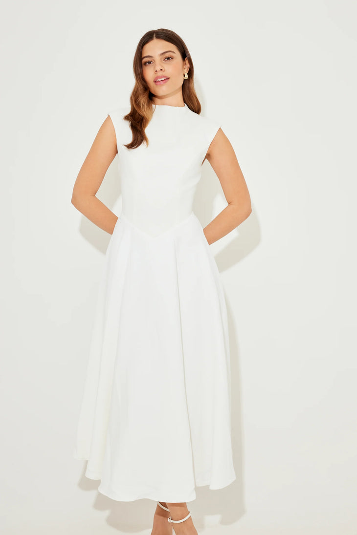 Woman wearing white sleeveless high waist midi dress with pleated skirt — Odd Muse | Endless UAE