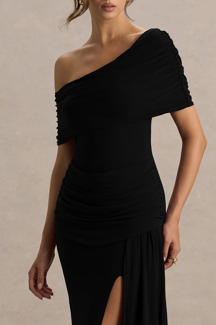 Woman wearing black asymmetric-neck maxi dress with draped off-shoulder sleeve detail — Club London | Endless UAE