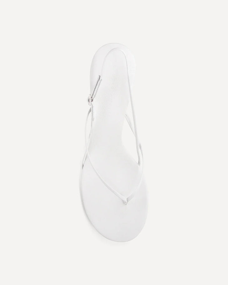 White leather slingback heel with curved wishbone design and sculpted kitten heel — Studio Amelia | Endless UAE