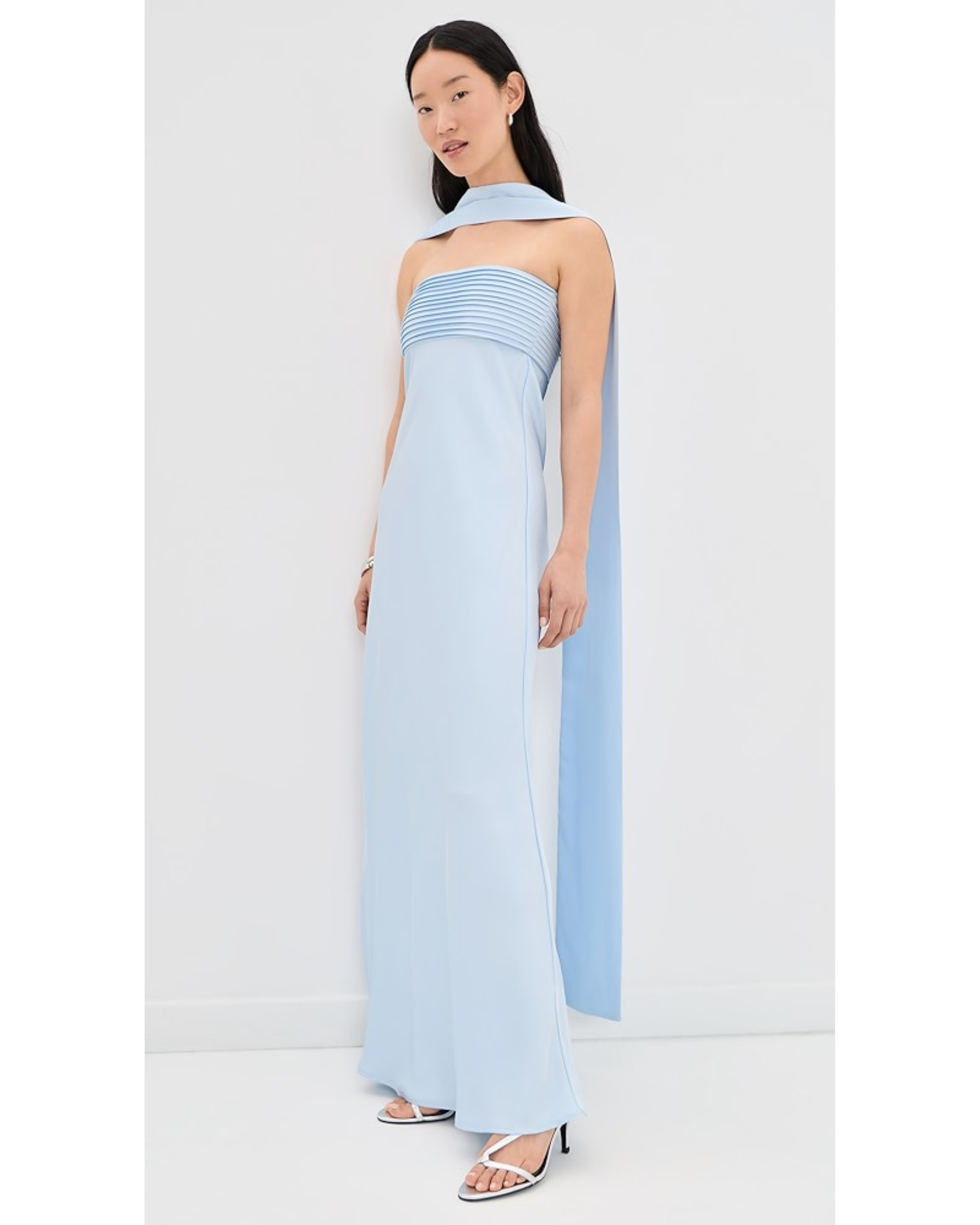 Woman wearing light blue sleeveless Elsa Maxi Dress with flowing duster — Runaway The Label | Endless UAE