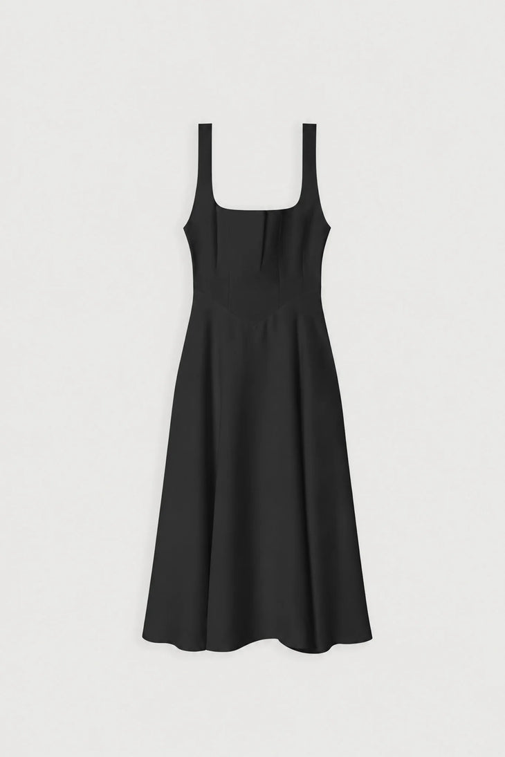 Woman wearing black square neck midi dress with white slides against neutral background — Odd Muse | Endless UAE