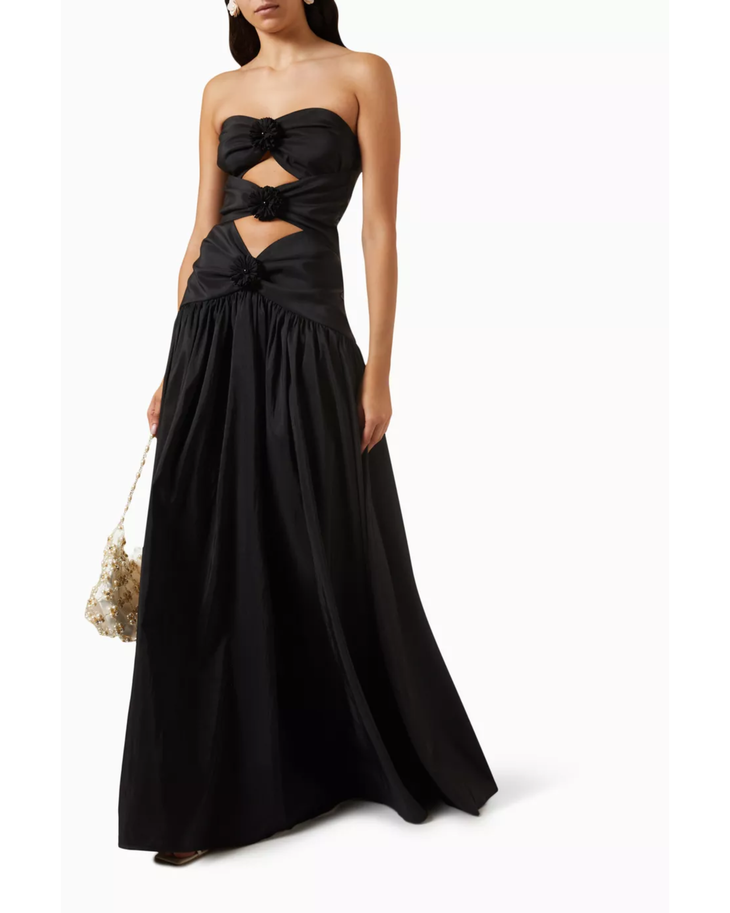 Black strapless maxi dress with cutout details and bow accents — Vanina | Endless UAE