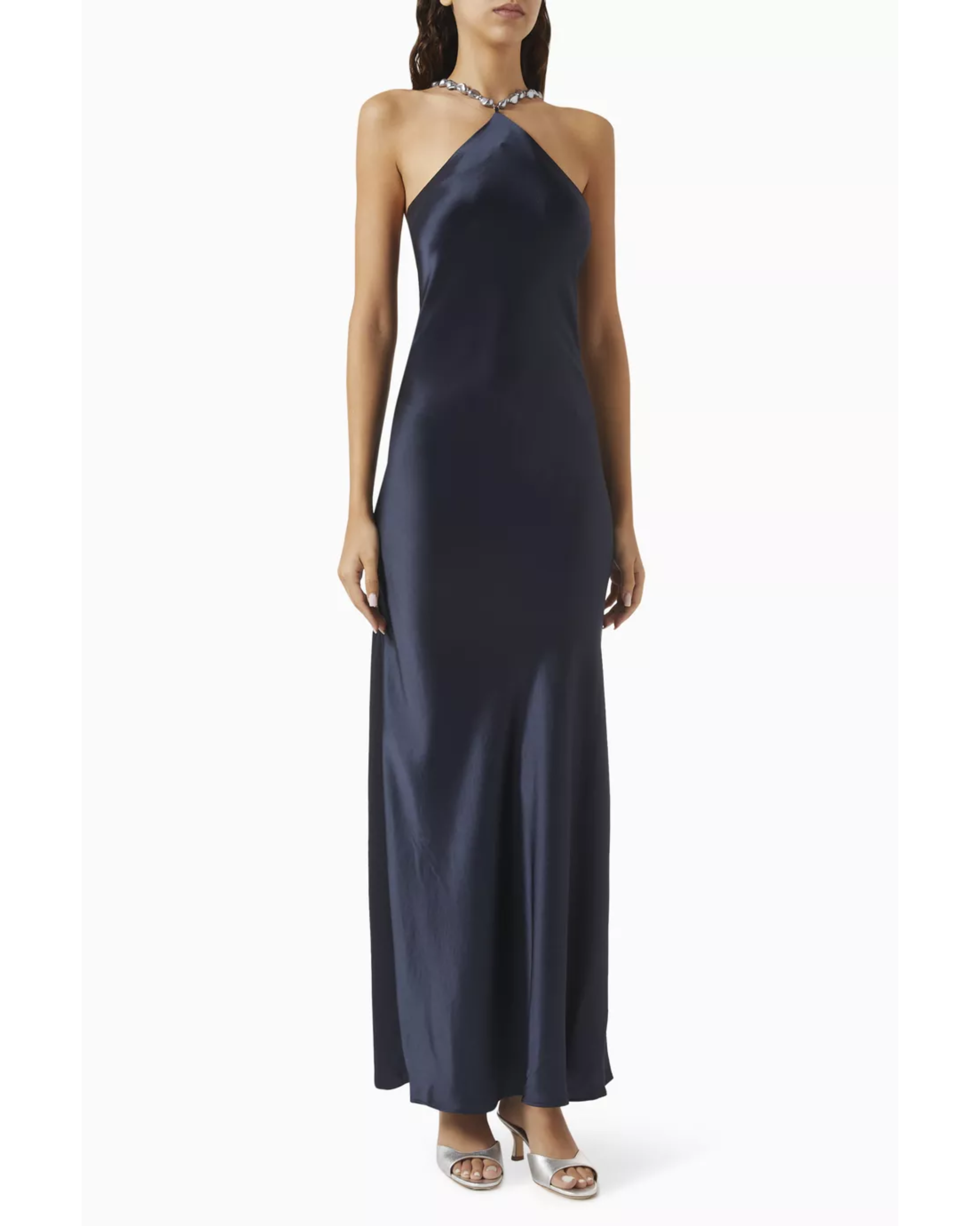 Woman wearing navy halter maxi dress with pearl-embellished neckline and metallic sandals — Staud | Endless UAE
