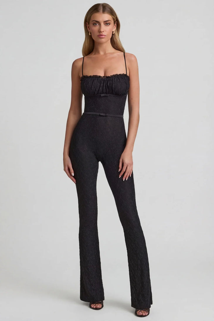 Black textured flared jumpsuit with ruched bustier top and thin straps — Oh Polly | Endless UAE