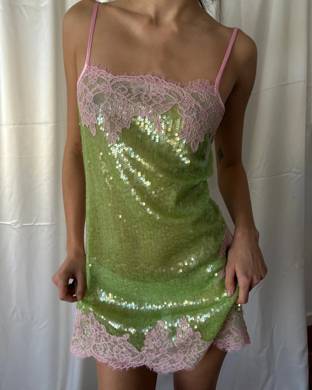 Green sequin mini dress with pink lace trim and adjustable straps — Hand Over | Endless UAE