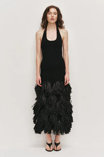 Black halter neck knit dress with tiered raffia fringe skirt — Aje | Endless UAE
