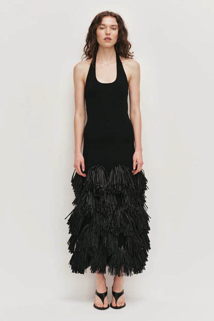 Black halter neck knit dress with tiered raffia fringe skirt — Aje | Endless UAE