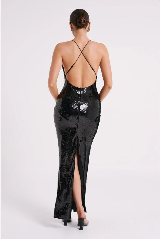 Woman wearing black sequin maxi dress with open back and thin straps — Meshki | Endless UAE