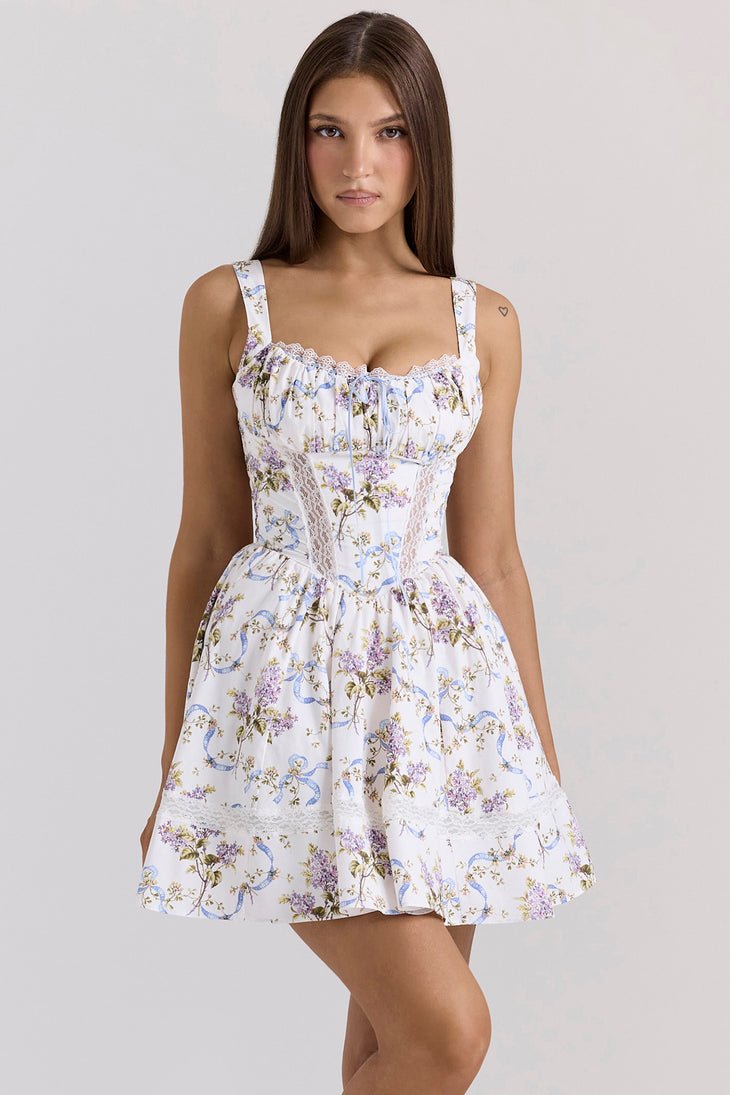 Woman wearing white floral ribbon print cotton mini dress with sweetheart neckline and full skirt — House of CB | Endless UAE