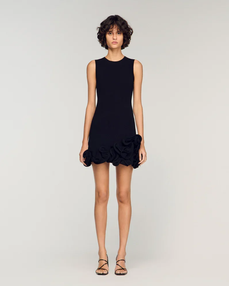Sleeveless black knit dress with ruffled floral hem detail — Sandro | Endless UAE