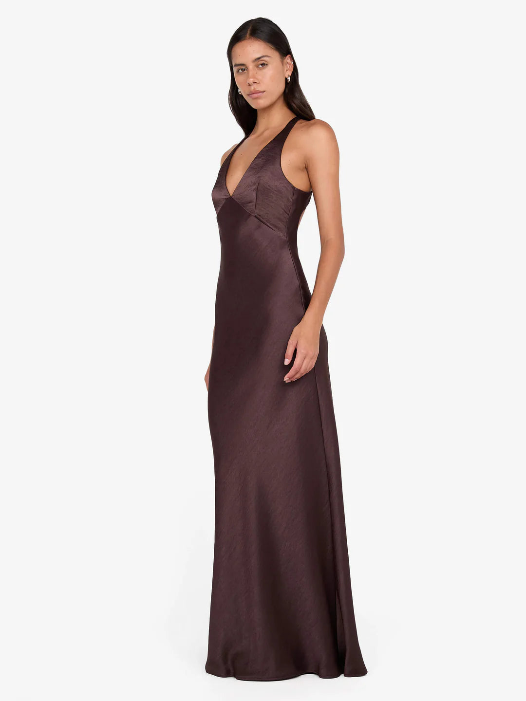 Woman wearing burgundy V-neck sleeveless maxi dress with flowing fabric — Bec & Bridge | Endless UAE