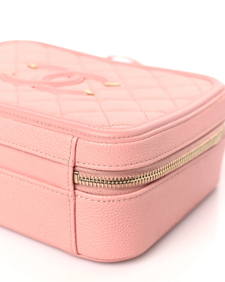 Pink quilted Chanel Filigree Vanity Bag with gold hardware and chain strap — Chanel | Endless UAE