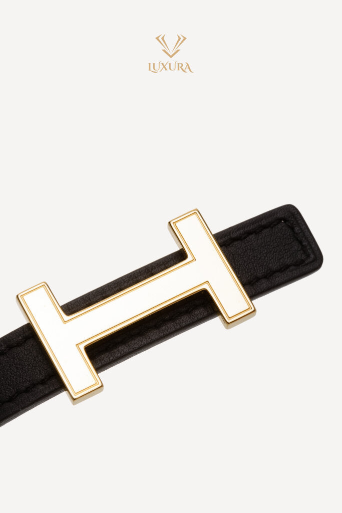 Black reversible leather belt with gold H buckle — Hermes | Endless UAE