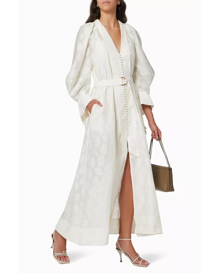 Woman wearing cream linen Parker dress with puffed sleeves and belt — Acler | Endless UAE