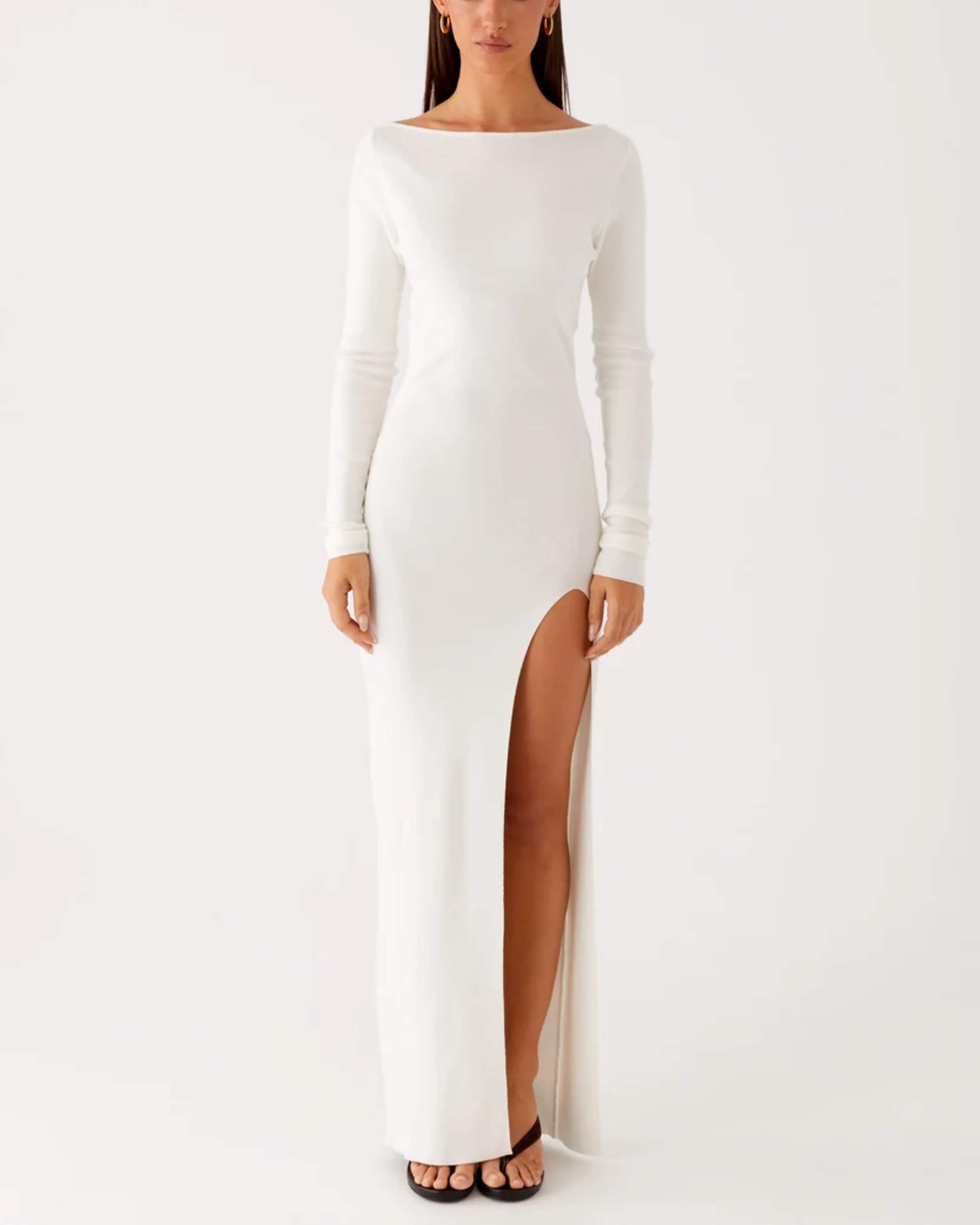 White long-sleeve knit maxi dress with high slit detail — Peppermayo | Endless UAE