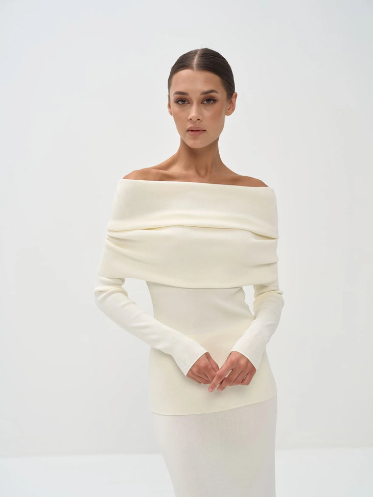 Cream off-shoulder knit top with long sleeves paired with matching maxi skirt — Nora The Label | Endless UAE