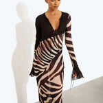 Sabine Dress in zebra print with long sheer sleeves and deep V-neckline — Rat & Boa | Endless UAE