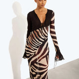 Sabine Dress in zebra print with long sheer sleeves and deep V-neckline — Rat & Boa | Endless UAE