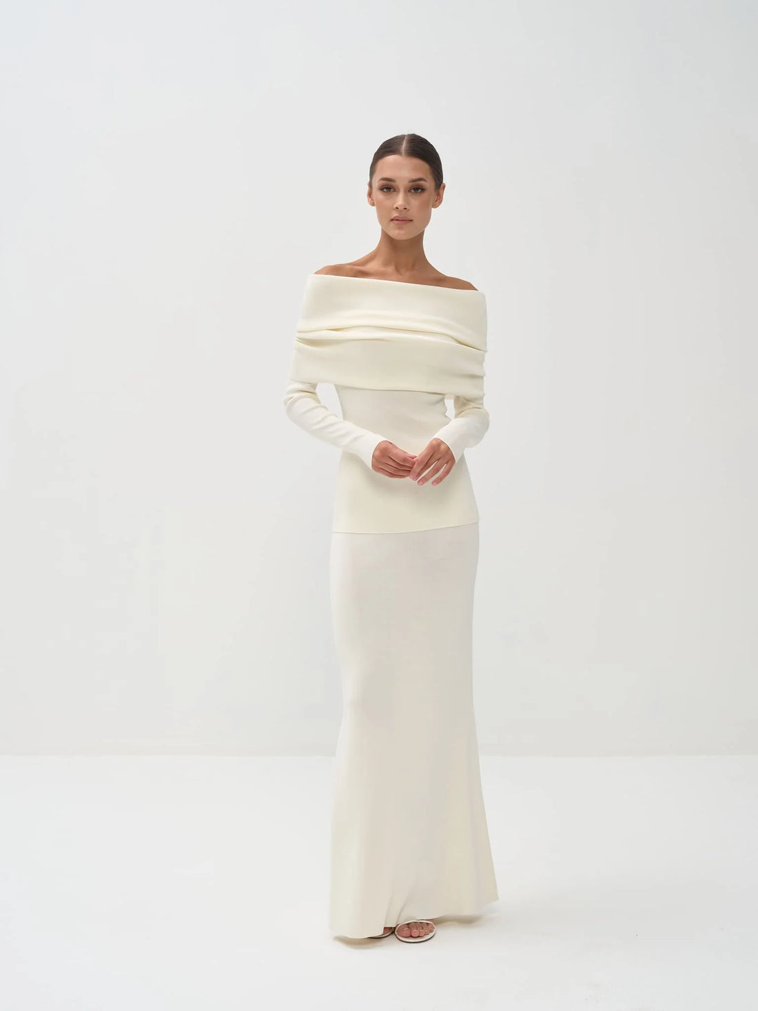 Cream off-shoulder knit top with long sleeves paired with matching maxi skirt — Nora The Label | Endless UAE