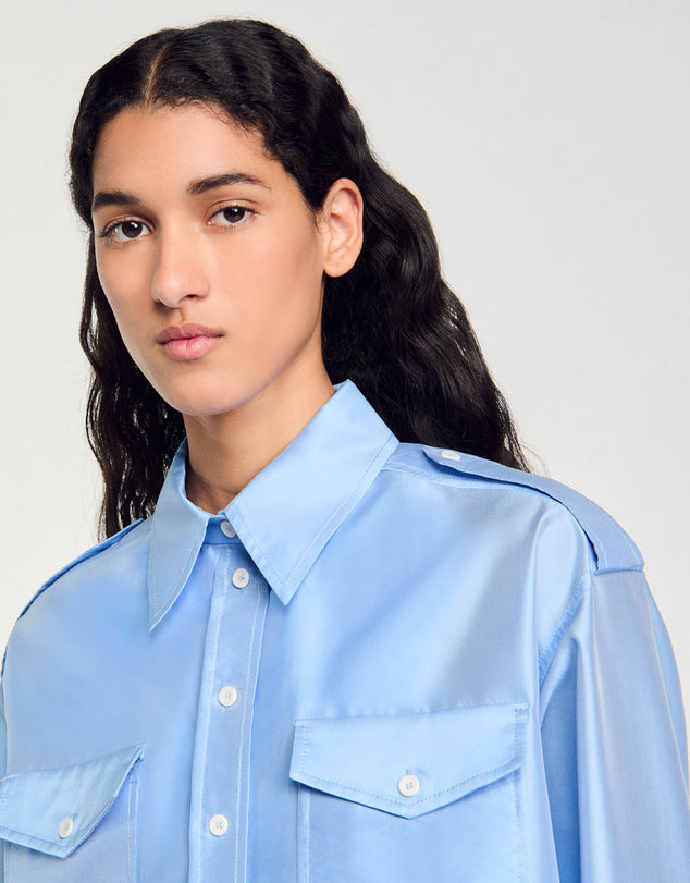Light blue oversized shirt with chest pockets worn open — Sandro | Endless UAE