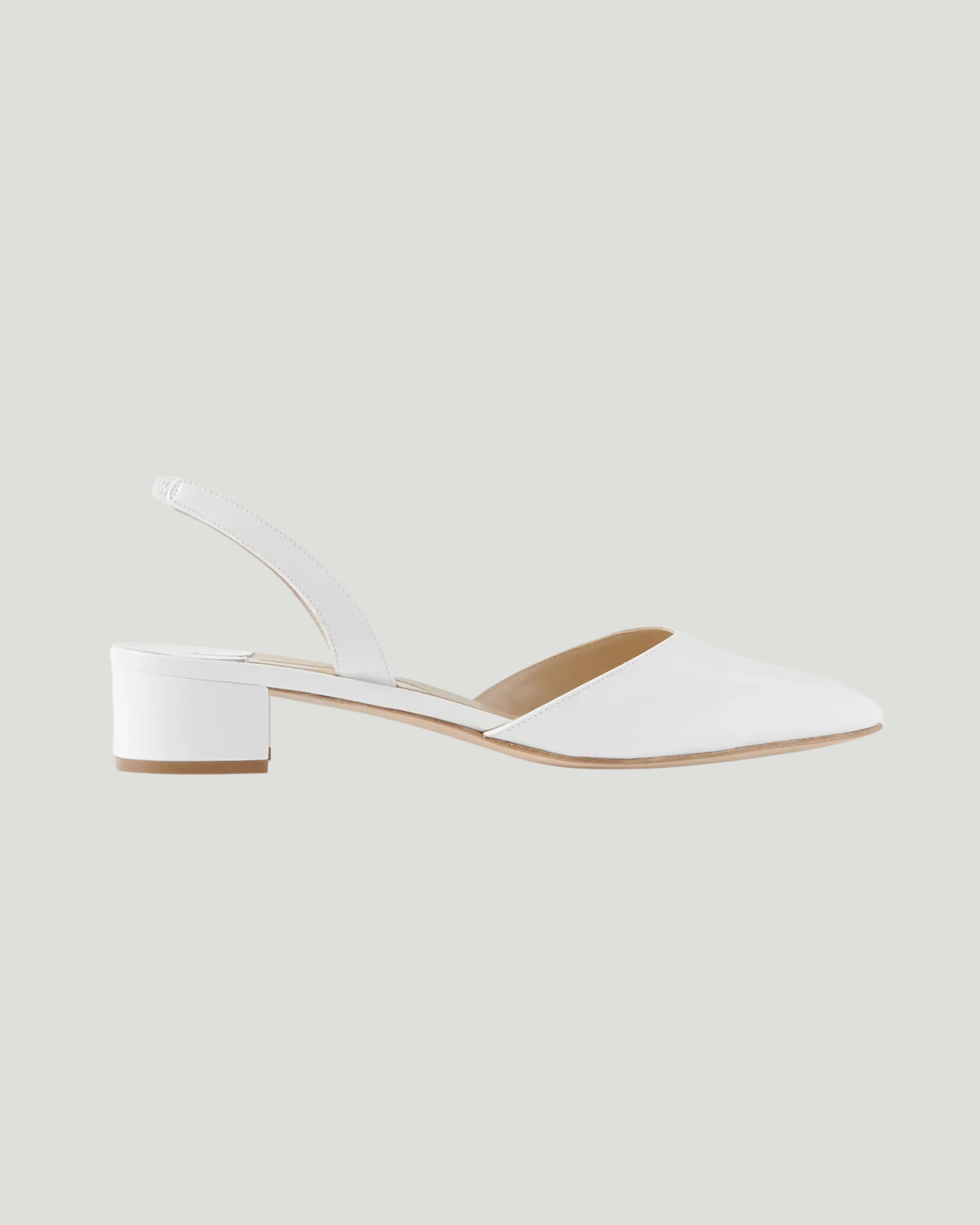 White patent-leather slingback pump with curved toe and low block heel — Manolo Blahnik | Endless UAE